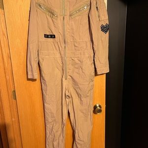 Men’s small/ fits women sm-med/Guess jumpsuit tan with black/never worn
